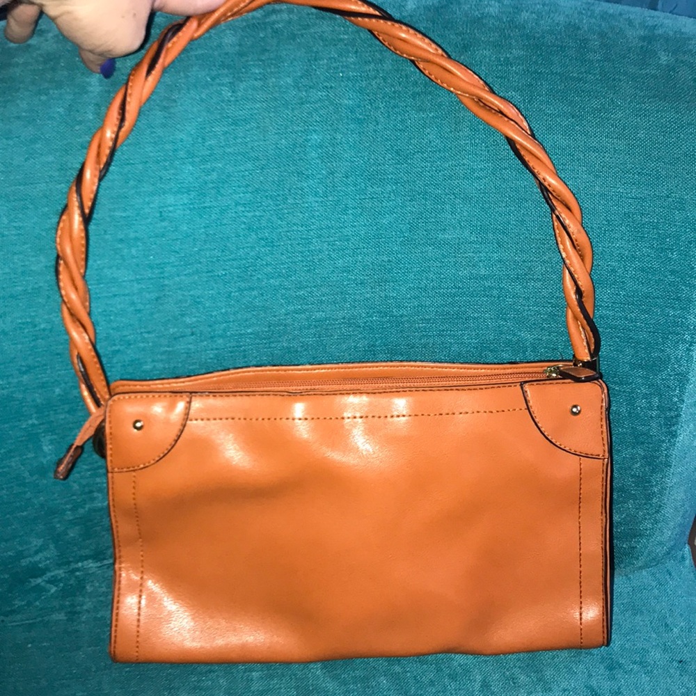 Trendy orange purse by Relic